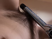 Sexy Lucy Dutch strips and combs her hairy pussy - picture #8