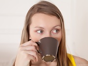 Sexy Stella sips coffee and gets naked naturally - picture #1