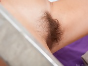 Marcy the hairy minx spreads her bush - picture #11