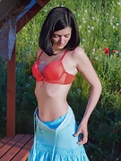 Lara D strips naked outdoors on her wooden bench  - picture #2