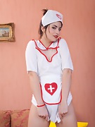 Hairy Cherry plays naughty nurse - picture #2