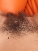 Marcia's hairy pussy lips on leather - picture #34