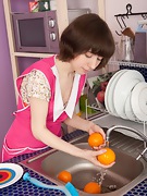 Miki cleans up in the kitchen - picture #2