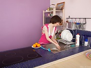 Miki cleans up in the kitchen - picture #17