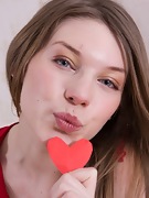 Amber S is covered in hearts and gets naked  - picture #15