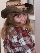 Cowboy Dani strips naked after having fun alone - picture #2