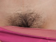 Hairy Sonya N bends over her dresser - picture #15