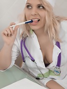 Jill plays a Doctor and masturbates in her chair  - picture #7