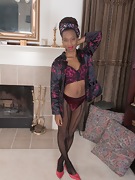 Saf strips nude by her fireplace - picture #7