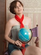 Aria enjoys a globe and then masturbates on floor - picture #3