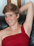 Aurora Odaire strips naked on her leather couch - picture #3