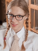 Abigail strips naked as a sexy student  - picture #2
