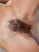 Hairy girl Eva spreads her all natural muff - picture #20