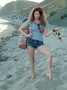Elena V strips and masturbates at the beach  - picture #1