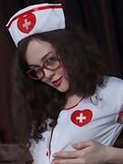 Ksenia Yankovskaya strips as a sexy doctor - picture #5