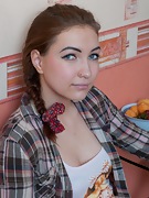 Young Sabrina strips in her kitchen - picture #1