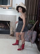 Grae Savage strips naked by her fireplace  - picture #16