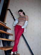 Indy uses stairs to show her hairy pussy - picture #16