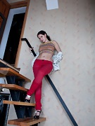 Indy uses stairs to show her hairy pussy - picture #17