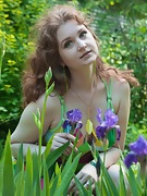 Bazhena strips naked in her outside garden  - picture #3