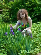 Bazhena strips naked in her outside garden  - picture #4