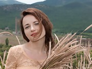 Shaya strips naked outdoors in her beige dress  - picture #3