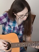 Ember Stone strips naked playing her guitar - picture #2