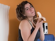 Guadalupe seductively enjoys a banana while naked - picture #10