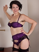 Hairy girl Sadie Lune strips in purple lingerie - picture #12