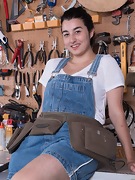 A very hairy Wara strips naked in her tool shop - picture #5