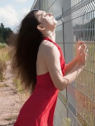 Lisa Li strips off her red dress outdoors - picture #6
