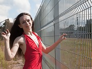 Lisa Li strips off her red dress outdoors - picture #7