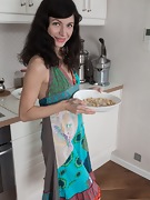Efina strips naked and masturbates in her kitchen - picture #8