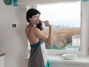 Efina strips naked and masturbates in her kitchen - picture #20