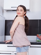 Sanita strips naked in her kitchen - picture #14