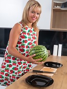 Jessy Fiery enjoys watermelon in her kitchen  - picture #4