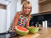 Jessy Fiery enjoys watermelon in her kitchen  - picture #7