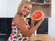 Jessy Fiery enjoys watermelon in her kitchen  - picture #8