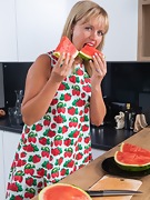 Jessy Fiery enjoys watermelon in her kitchen  - picture #10