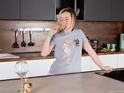 Sasha K strips naked on her kitchen counter - picture #2