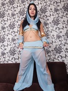 Tanita strips naked in her belly dancer uniform  - picture #21