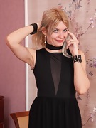 Greta Grace strips off her black dress and mask - picture #15