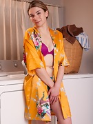 Lydia strips naked by her washing machine - picture #8