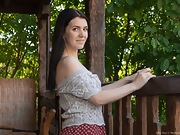 Elley Ray enjoys her backyard and then masturbates - picture #1