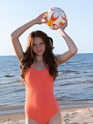 Polly strips naked at the beach with her ball - picture #6