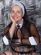 Animee dresses as a nun and then masturbates - picture #18