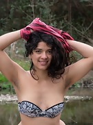 Maria F strips naked outside on the rocks - picture #17