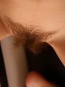 Beata watches herself dildo her hairy pussy - picture #34
