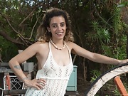 Lula strips naked outside by her wooden wheel - picture #2