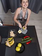 Zlata masturbates in her kitchen with a pepper - picture #11